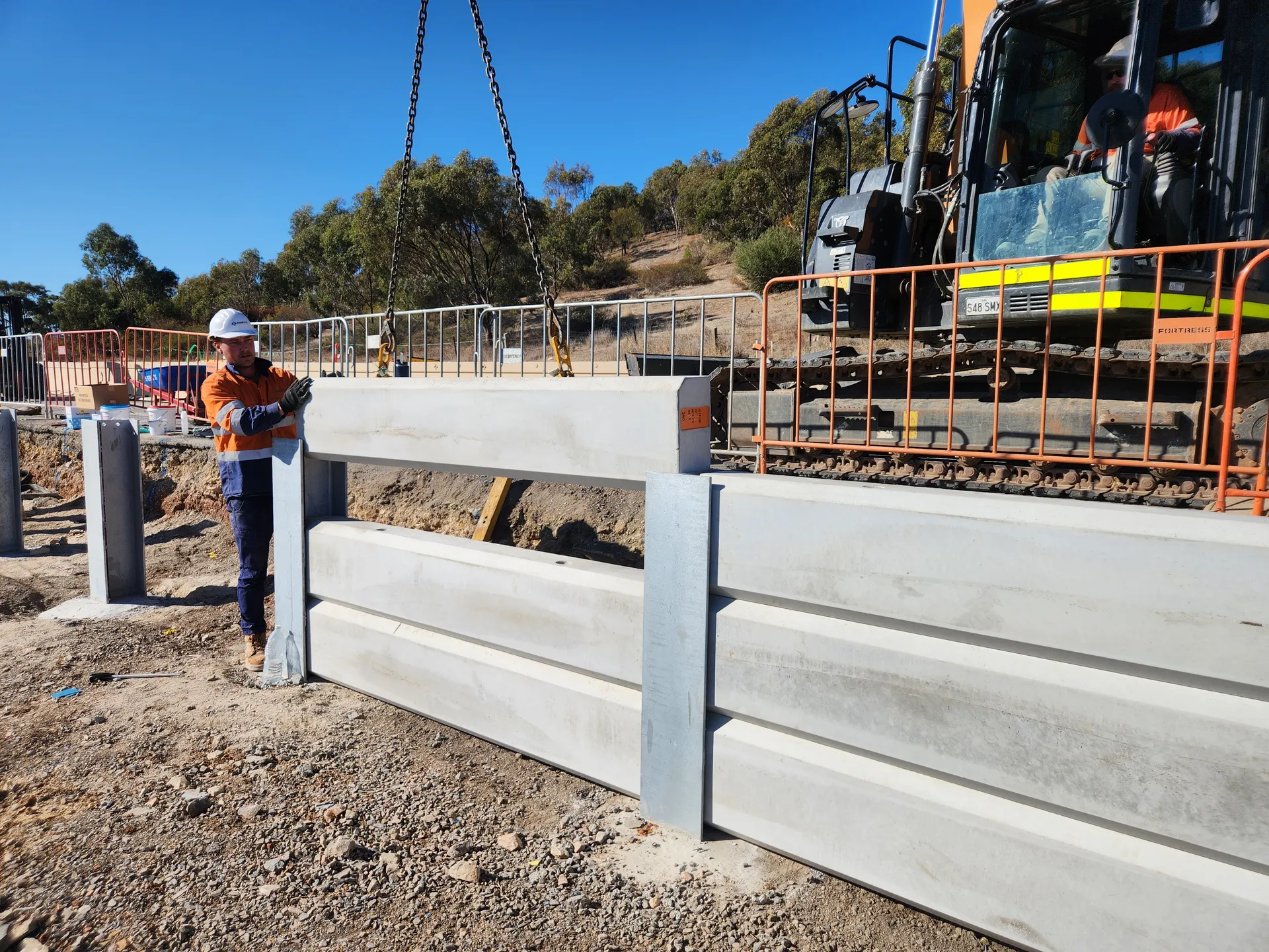 Finished concrete sleeper retaining wall — Ultra Level build